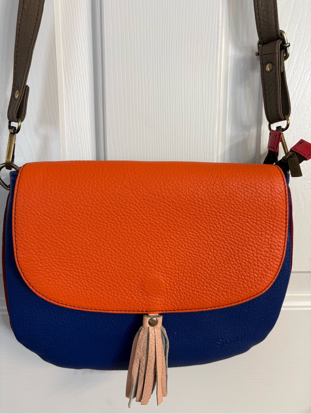 Soruka Pebbled Leather Tassel Crossbody Bag